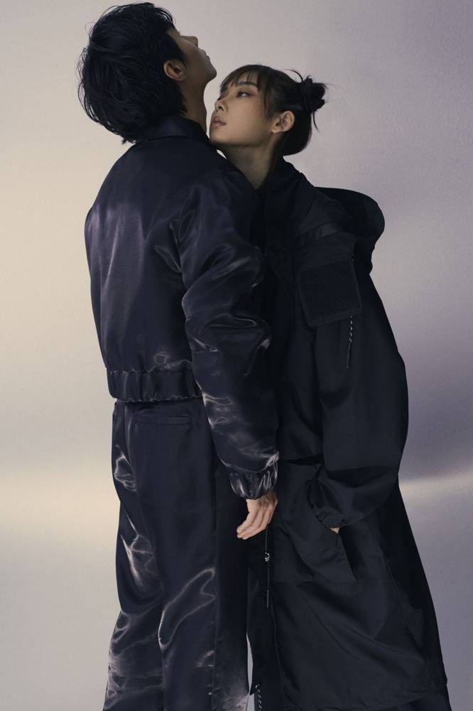 Two people leaning into each other